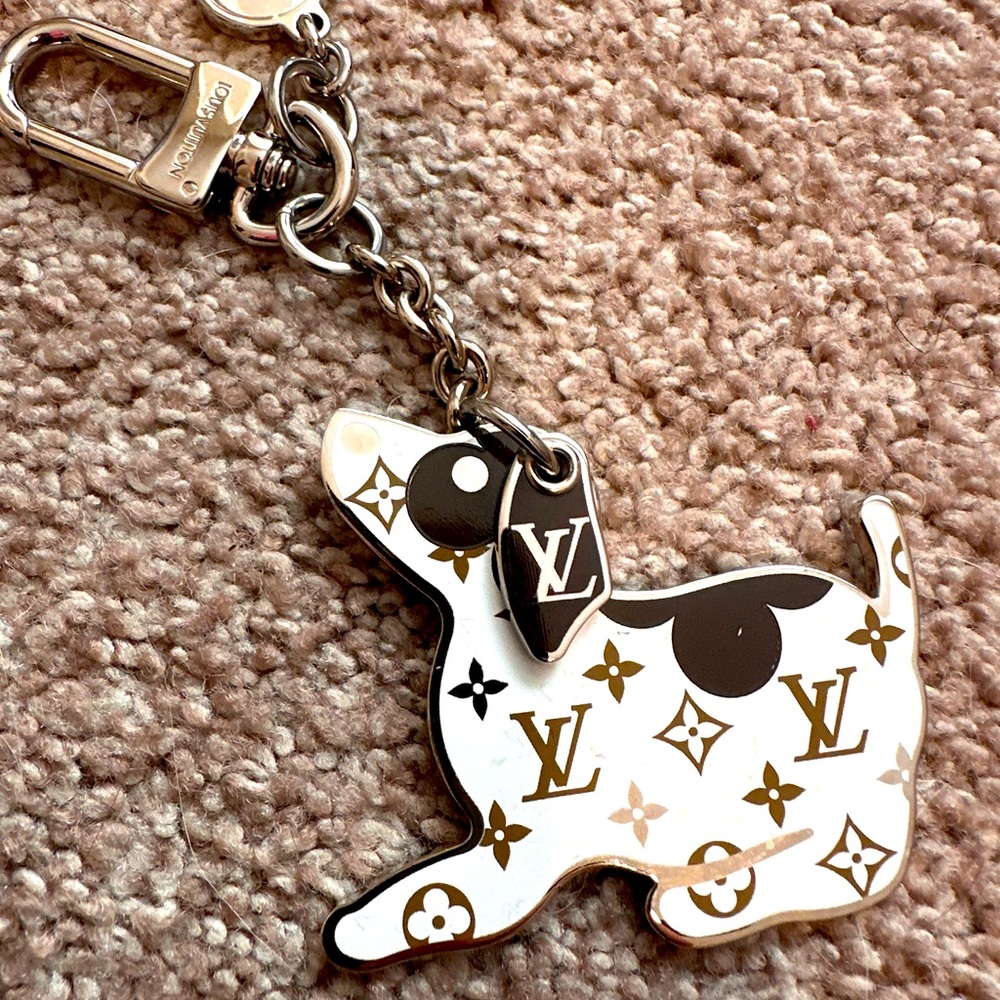 Louis Vuitton key holder and/or bag charm.